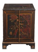 A black lacquer and gilt decorated cupboard  , late 18th/ early 19th century,  with gilt and