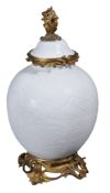 A Continental porcelain gilt-metal mounted white ovoid Chinese-style vase,   mounted in the 18th
