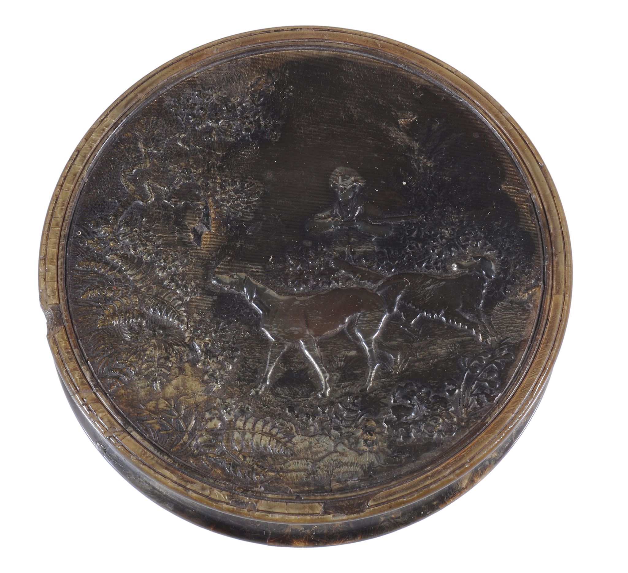 A George III pressed horn circular snuff box,   circa 1800, the cover with a huntsman and two