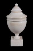 An ivory urn and cover,   English, late 18th/early 19th Century,  of turned cylindrical form,
