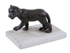 A Continental bronze model of a lion club,   late 19th century, on a rectangular white marble base,