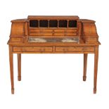 A George III satinwood, marquetry and rosewood crossbanded Carlton House desk, circa 1790, with an