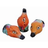 A pair of Staffordshire pottery fox mask stirrup cups  , second half 19th century,  each coloured