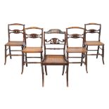 A set of four WIlliam IV grained rosewood chairs  , circa 1835,  with turned top rails and scroll