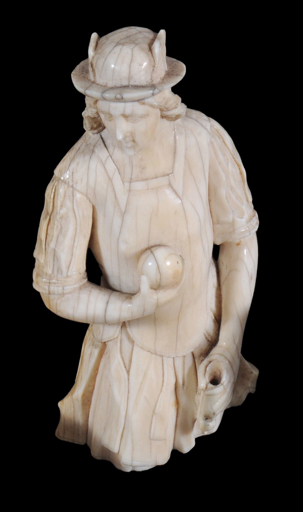 A Continental sculpted ivory bust of Mercury,   circa 1700,  portrayed wearing  petasus  , a ball