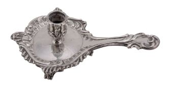 A George IV cast silver chamber candlestick by Charles Price,   London 1828, the lobed capital with