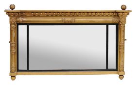 A Regency giltwood and ebonised triple plate overmantel mirror  , circa 1815, with ball finials