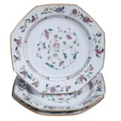 Three famille rose octagonal plates,   Qing Dynasty, Qianlong (1736-95),  the centres with