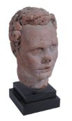 A sculpted red stone model of the head of a man in Renaissance taste,   probably 19th century,