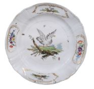 A Copenhagen plate  , late 18th century,  the centre painted with a goose, the rim with four