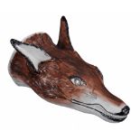 A Staffordshire pearlware fox head stirrup cup  , circa 1800,  with painted brown  head, mouth and