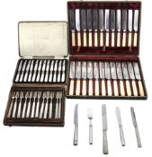 A collection of silver, silver plate and stainless steel flatware and cutlery,   comprising: a late
