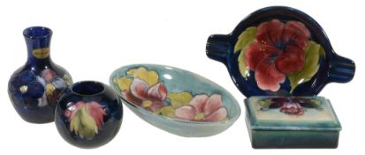 Five Moorcroft items,   comprising: Hibiscus, a circular ashtray with twin rests, impressed mark,