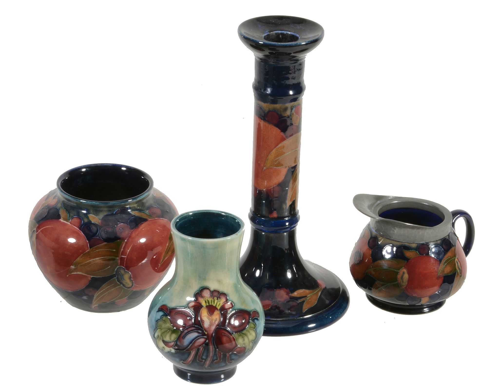 Pomegranate, a Moorcroft 8in candlestick,   impressed mark, green painted initials, 20.5cm high;