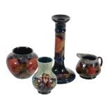 Pomegranate, a Moorcroft 8in candlestick,   impressed mark, green painted initials, 20.5cm high;