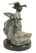 Lyle Sopel (Canadian, b. 1952), a green nephrite carving of two ducks flying,   signed   Sopel F033