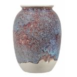 A Ruskin Pottery high fired ovoid vase,   in a flambe red, deep amethyst and blue speckled with