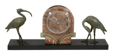 A French Art Deco bronze, marble and onyx mantel clock,   with a Marti eight day timepiece