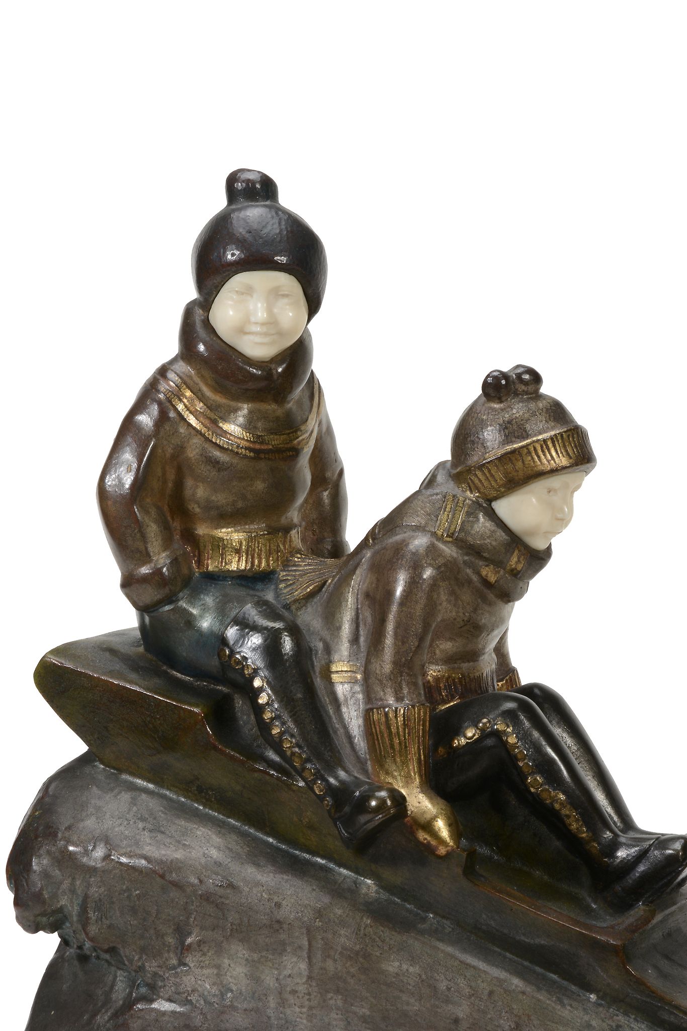 H. M. White, an Art Deco patinated and gilt bronze and ivory model of two children on a sledge, - Image 3 of 3