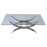 A glass and chromium plated steel coffee table,   1970s, the base arranged as two arched Xs, 45cm