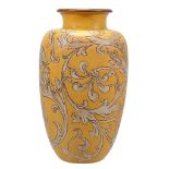 A Martin Brothers stoneware shoulder ovoid vase,   incised with white flowering scroll foliage on a