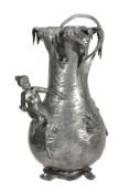 A WMF pewter large figural flower vase,   model no. 127, the leaf frond rim with a putti and leaf
