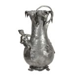 A WMF pewter large figural flower vase,   model no. 127, the leaf frond rim with a putti and leaf