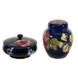 Hibiscus, a Moorcroft ovoid jar and cover,   impressed marks, blue painted initials, 15cm high;