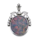 A diamond and opal triplet pendant , the oval opal triplet panel with a...  A diamond and opal