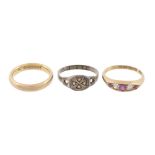 A ruby and diamond ring, set with alternating circular shaped rubies and old...  A ruby and