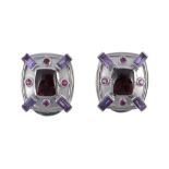 A pair of gem set ear clips, the central rectangular shaped cabochon garnet...  A pair of gem set
