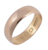 A 22 carat gold band, of plain form, stamped 22 with full Birmingham hallmarks  A 22 carat gold
