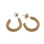 A pair of tubogaz earrings, the hoops of tubogaz design, with post fittings  A pair of tubogaz