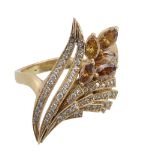 A diamond floral spray dress ring, the pierced panel with eight cut diamond...  A diamond floral