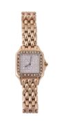 A lady's diamond set wristwatch, the rectangular dial set with brilliant cut...  A lady's diamond