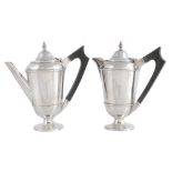 A pair of silver cafe au lait pots by S. W. Smith & Co  A pair of silver cafe au lait pots by S.