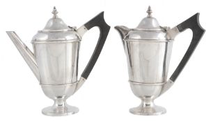 A pair of silver cafe au lait pots by S. W. Smith & Co  A pair of silver cafe au lait pots by S.