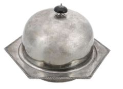 A silver muffin dish and cover by Harrison Brothers & Howson  A silver muffin dish and cover by