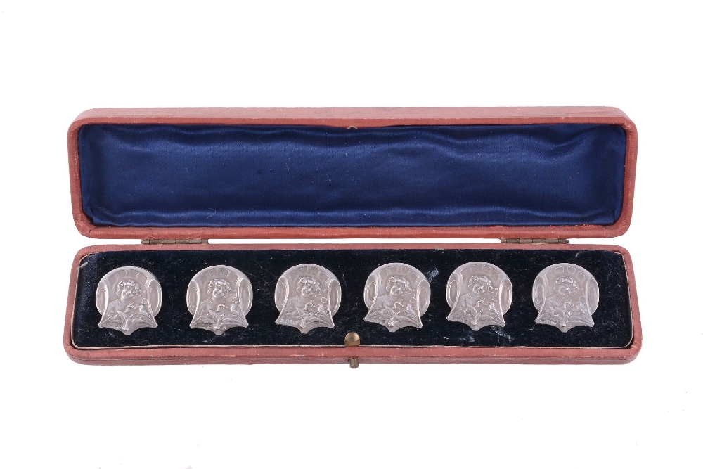 A set of six Art Nouveau silver buttons, import marked for London 1904, sponsor  A set of six Art