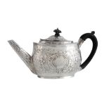 A George III silver later decorated oval tea pot by Solomon Hougham  A George III silver later