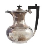 A silver oblong baluster hot water jug by G. Bryan & Co  A silver oblong baluster hot water jug by