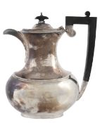 A silver oblong baluster hot water jug by G. Bryan & Co  A silver oblong baluster hot water jug by