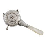 A silver and mother of pearl novelty child's rattle by Crisfold & Norris Ltd  A silver and mother of