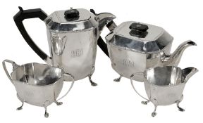 A silver four piece facetted tea set by Stower & Wragg Ltd  A silver four piece facetted tea set