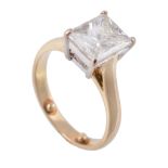 A diamond single stone ring, the rectangular princess cut weighing 2  A diamond single stone ring,