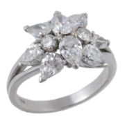 A diamond cluster ring, set with a cluster of pear shaped diamonds and...  A diamond cluster ring,