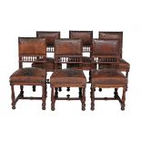A set of twelve French walnut dining chairs, circa 1900  A set of twelve French walnut dining