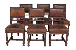 A set of twelve French walnut dining chairs, circa 1900  A set of twelve French walnut dining