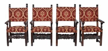 A harlequin set of four upholstered and carved oak framed chairs  A harlequin set of four
