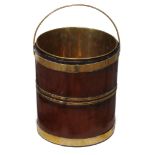 A George III brass bound mahogany bucket , circa 1770  A George III brass bound mahogany bucket  ,